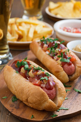 hot dogs with tomato salsa and onions