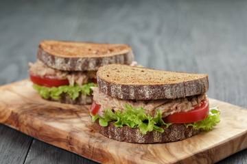 Sandwich with tuna and vegetables on rye bread