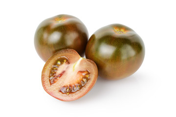 ripe kumato tomatoes isolated on white
