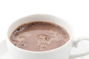 a cup of chocolate on white