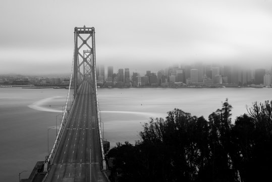 Fototapeta Downtown San Francisco with fog black and white