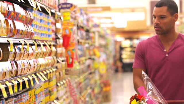 Man Shopping In Supermarket