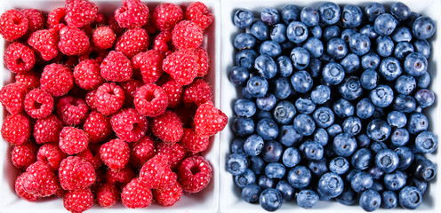 Clouse up Fresh Organic  Blueberries and Raspberries. Rich with vitamins Background, texture