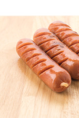 grill sausage on wood board