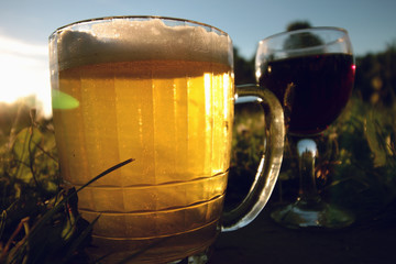 mug of beer at sunset