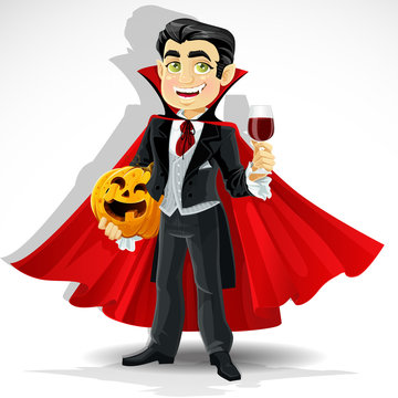 Charming predatory vampire with Halloween pumpkin