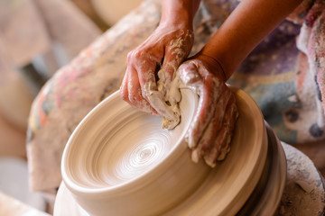 Woman potter hands crafts