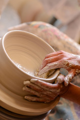 Woman potter hands crafts - 86864413