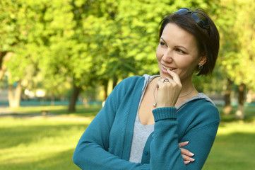 Fototapeta premium Happy woman in summer park