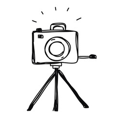 camera with tripod hand drawn vector
