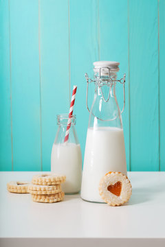 Old fashion milk jars with heart shaped cookies