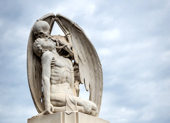 kiss of death statue at Poblenou Cemetery in Barcelona, Spain