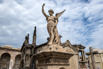 Fototapeta na wymiar grave sculpture at Poblenou Cemetery in Barcelona, Spain