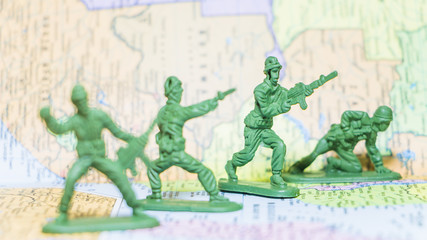 Toy Soldiers  on paper map background