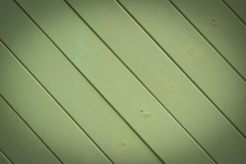 Obraz premium beautiful diagonal green wood background texture