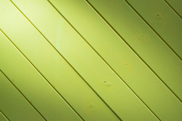 Obraz premium beautiful diagonal green wood background texture with light fro