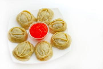 manti and spicy sauce