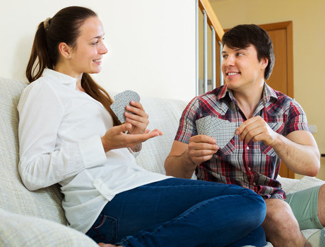 Young Couple Playing Cards