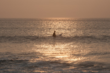 Fototapeta premium Surfer Waiting for Wave off Cape Cod