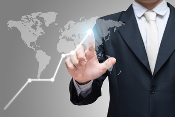 Businessman standing posture hand touch financial symbols coming