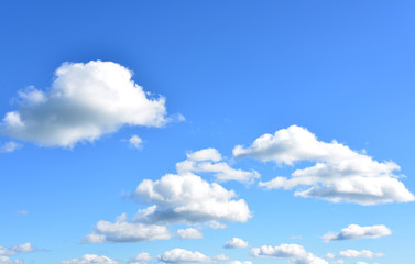 Naklejka na ściany i meble Blue sky with cumulus clouds. Summer background. Clouds