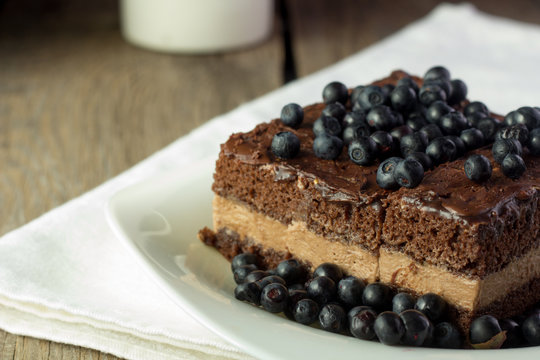 Chocolate cake with blueberry closeup