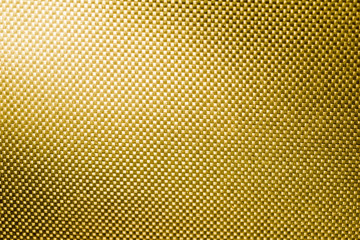 gold fabric nylon background texture with light from corner