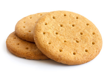 Stack of sweetmeal digestive biscuits isolated on white.