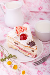 White cream cake with cherry