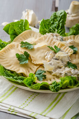 Ravioli stuffed with mushrooms and ricotta