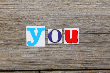 Fototapeta premium The word you in cut out magazine letters