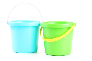 Plastic buckets isolated on white
