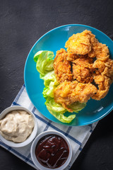 Hot breaded pieces of chicken.