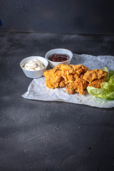 Hot breaded pieces of chicken.