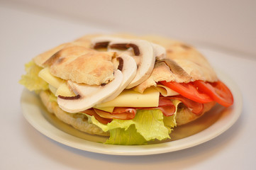sendvіch with cheese and champignons isolated in white