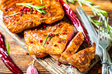 Fried piece of pork on a board