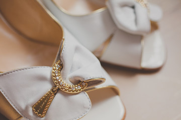 Closeup of fashionable bridal elegant wedding shoes