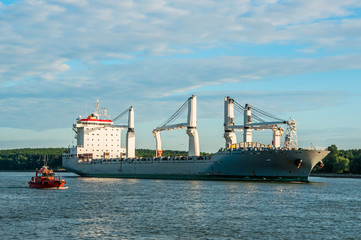 Big industrial cargo ship in port
