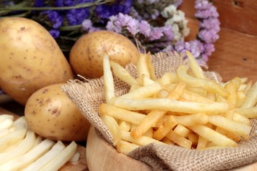 French fries and fresh potatoes sliced