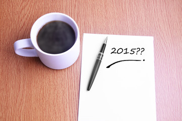 Coffee, pen and notes write 2015