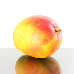 ripe mango fruit with shedow in pure white background