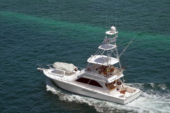 Fototapeta Sport Fishing Boat Cruising in the Bahamas