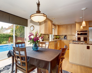 State of the art kitchen with hardwood fl oor and glossy counter