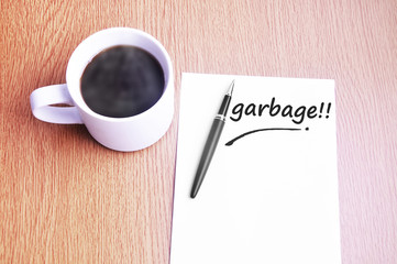 Coffee, pen and notes write garbage