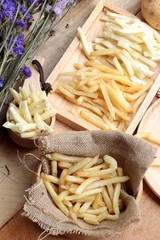 French fries and fresh potatoes sliced