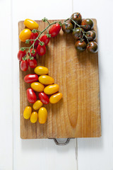 various types of cherry tomatoes: red, yellow and black Sicilian