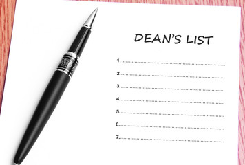 Pen  and notes paper with deans list - 86899423