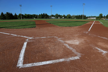 A low angle shot of a baseball field..