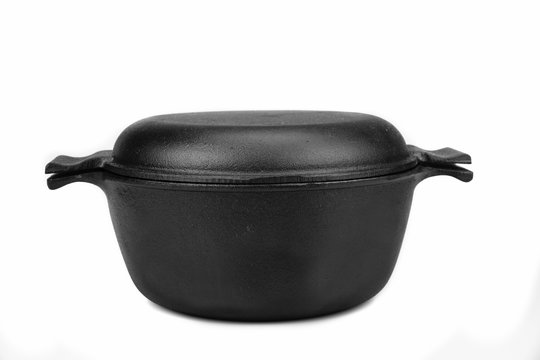 Front  View  On The Closed Cast Iron Pan Isolated