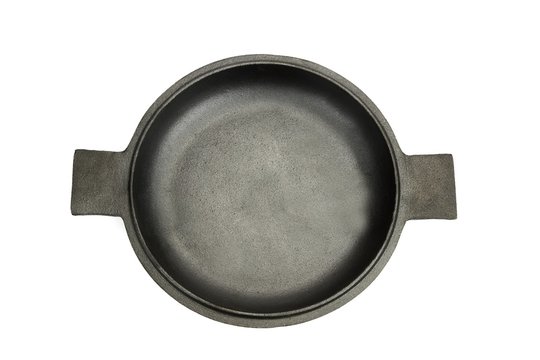 High Angle View On The Opened Cast Iron Pan Isolated
